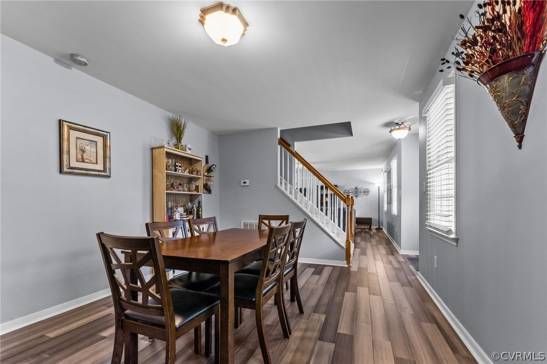 14419 Gatewood Road Dewitt, VA 23840 - Photo 7 of 36 a dining room with furniture and wooden floor