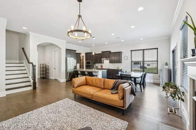 a spacious bedroom with a bed and a window