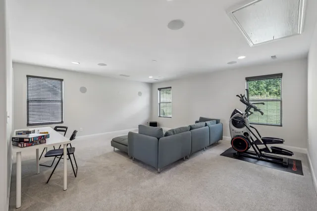 a living room with furniture and a couch