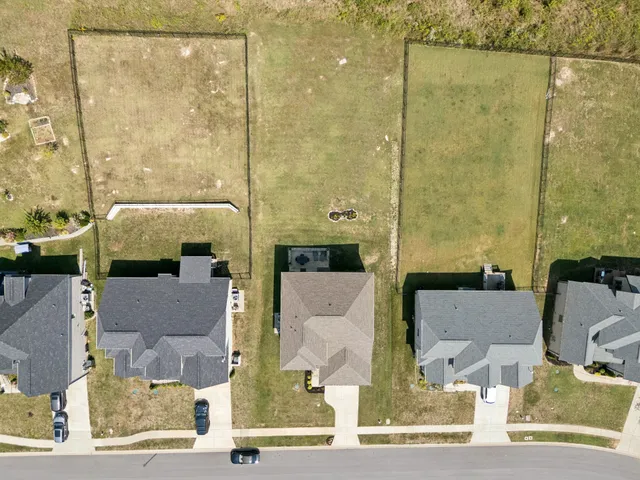 view of living room with furniture and floor to ceiling window