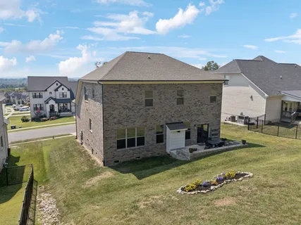 an aerial view of residential building and lake view