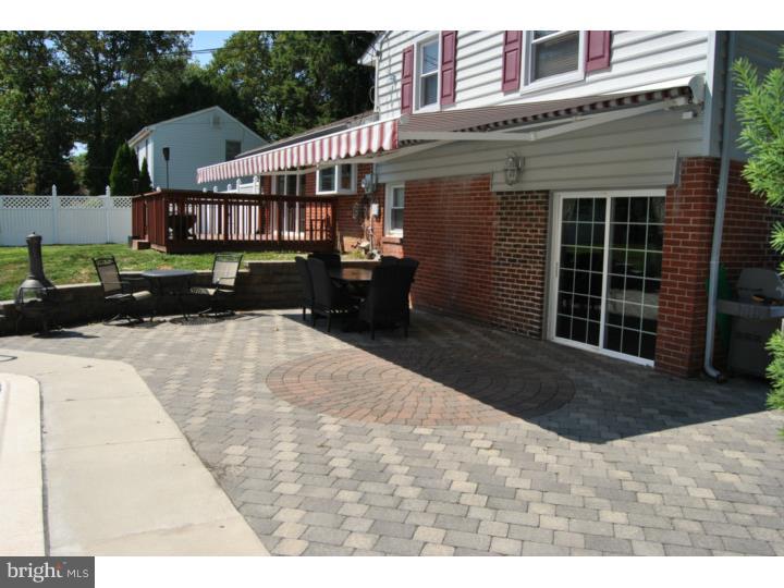 1141 Oliver Road Huntingdon Valley, PA 19006 - Photo 2 of 25 a front view of a house with a yard
