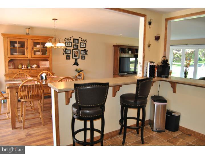 1141 Oliver Road Huntingdon Valley, PA 19006 - Photo 14 of 25 a view of a dining room with furniture and chandelier