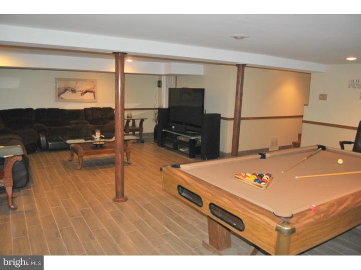 1141 Oliver Road Huntingdon Valley, PA 19006 - Photo 16 of 25 a living room with furniture and a flat screen tv