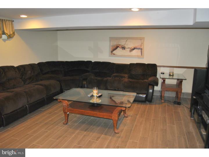 1141 Oliver Road Huntingdon Valley, PA 19006 - Photo 17 of 25 a living room with furniture and a wooden floor