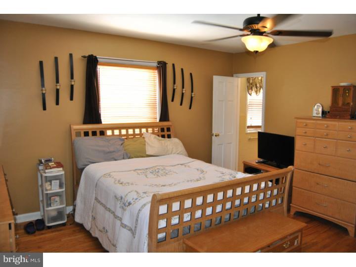 1141 Oliver Road Huntingdon Valley, PA 19006 - Photo 19 of 25 a bedroom with a bed and a dresser