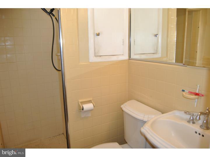 1141 Oliver Road Huntingdon Valley, PA 19006 - Photo 20 of 25 a bathroom with a sink and mirror