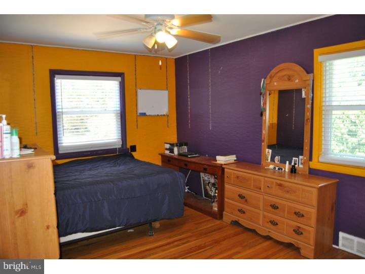 1141 Oliver Road Huntingdon Valley, PA 19006 - Photo 21 of 25 a bedroom with a bed and a dresser