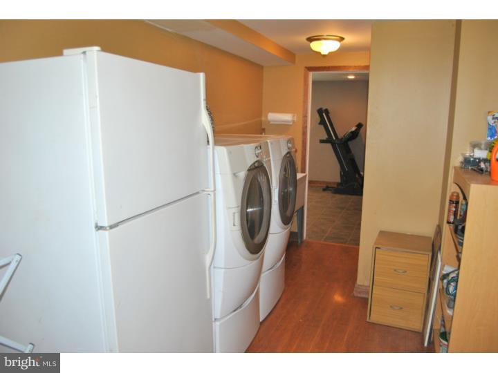 1141 Oliver Road Huntingdon Valley, PA 19006 - Photo 25 of 25 a utility room with dryer and washer