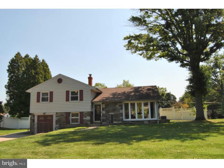 1141 Oliver Road Huntingdon Valley, PA 19006 - Photo 4 of 25 a front view of a house with a yard