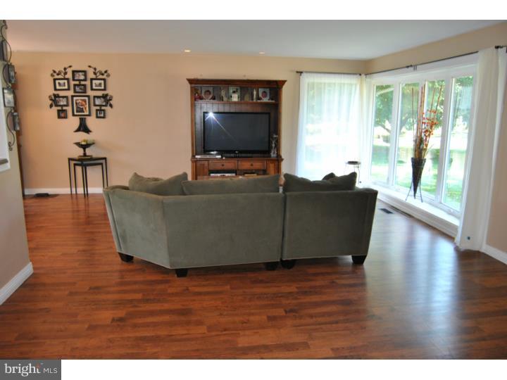 1141 Oliver Road Huntingdon Valley, PA 19006 - Photo 8 of 25 a living room with furniture and a flat screen tv