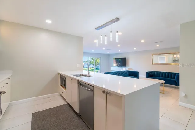 a kitchen with a stove and a microwave