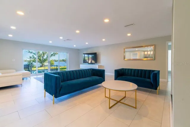 a kitchen with a sink and a stove top oven