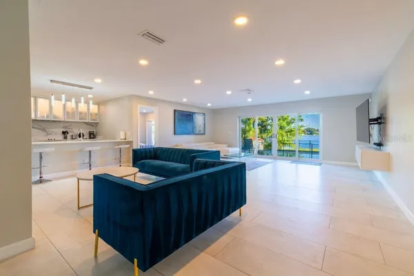 a living room with furniture and a table