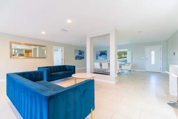 a view of a living room and a window