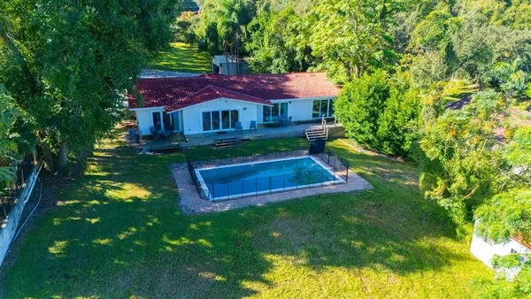 a view of a house with pool