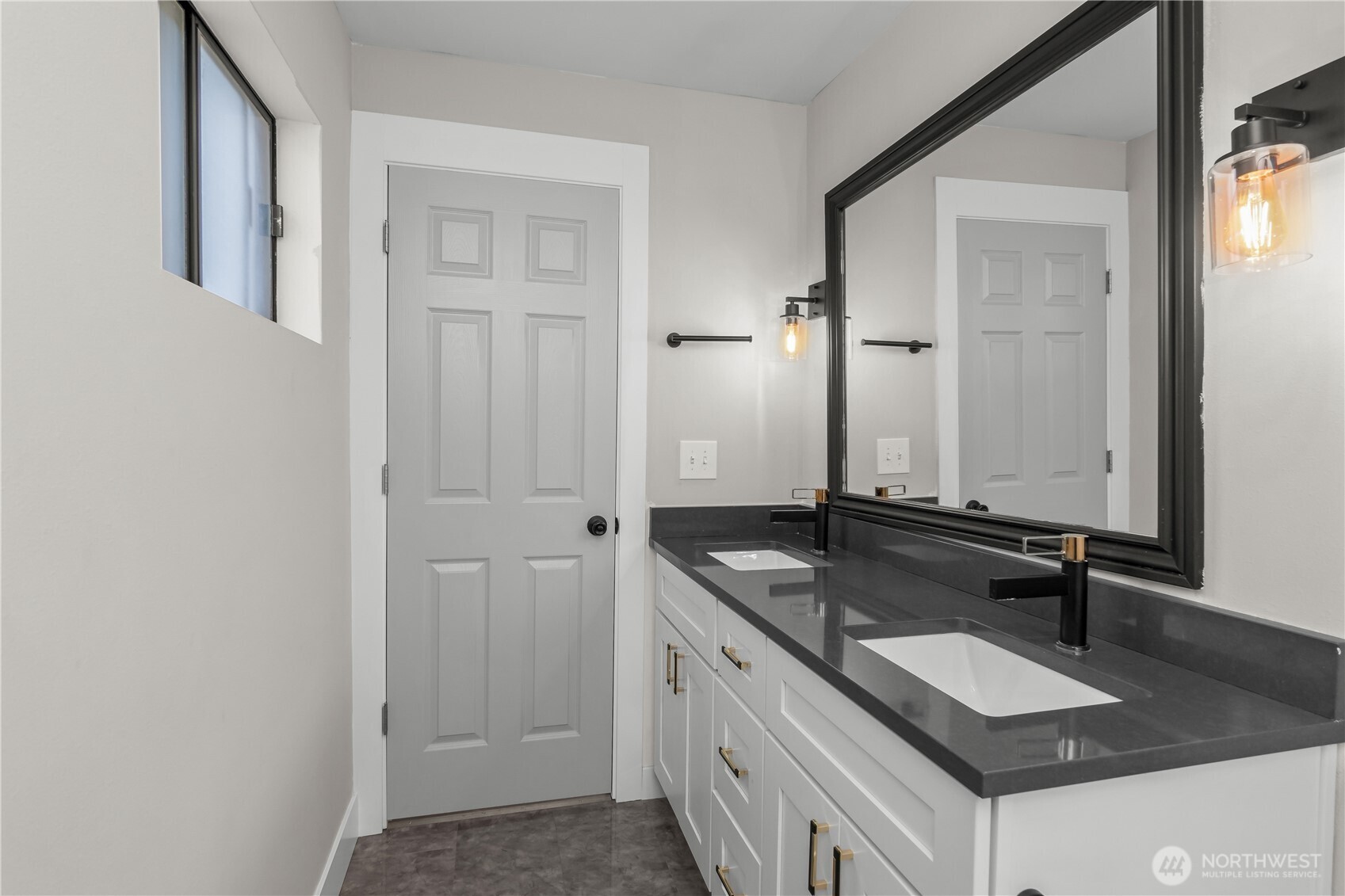625 173rd Street South Spanaway, WA 98387 - Photo 19 of 35 a bathroom with a granite countertop sink and a mirror