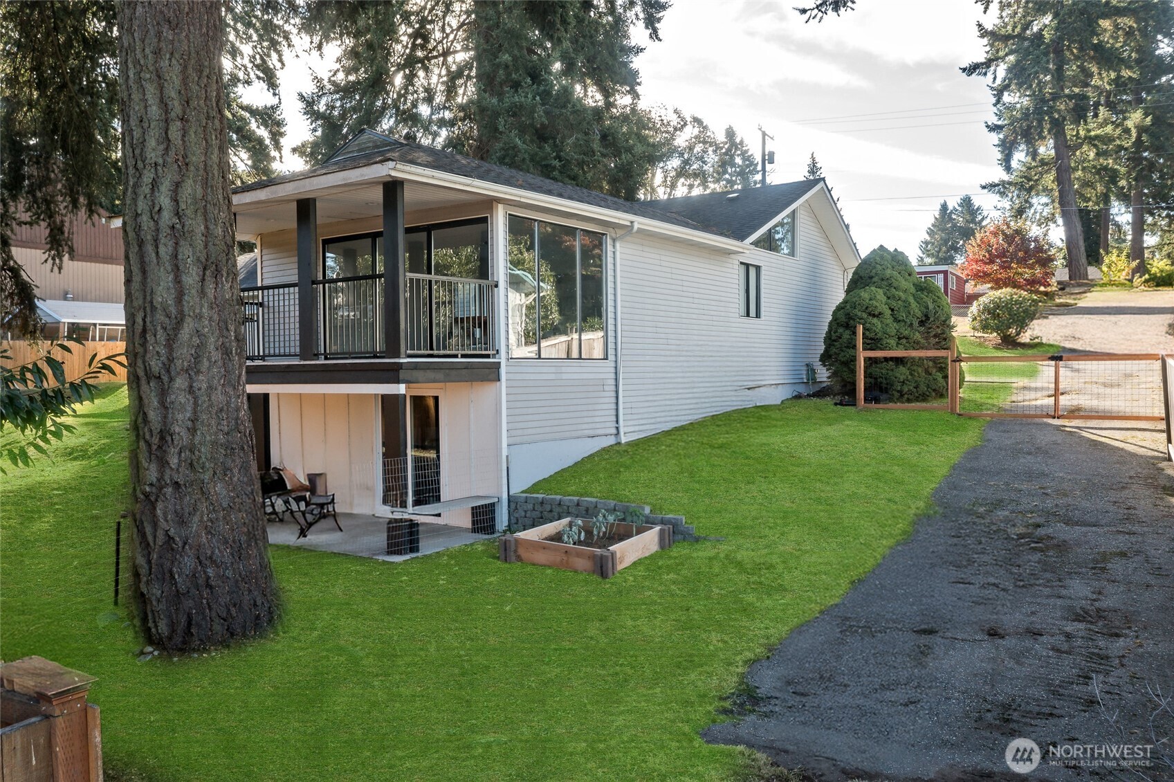 625 173rd Street South Spanaway, WA 98387 - Photo 32 of 35 a view of a house with a yard