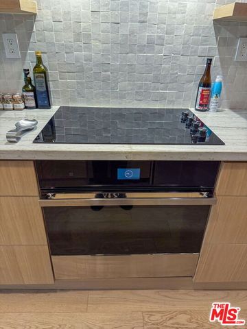 a close view of sink and stove