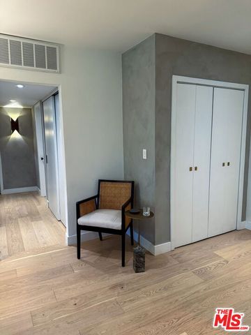a view of a livingroom with furniture and wooden floor