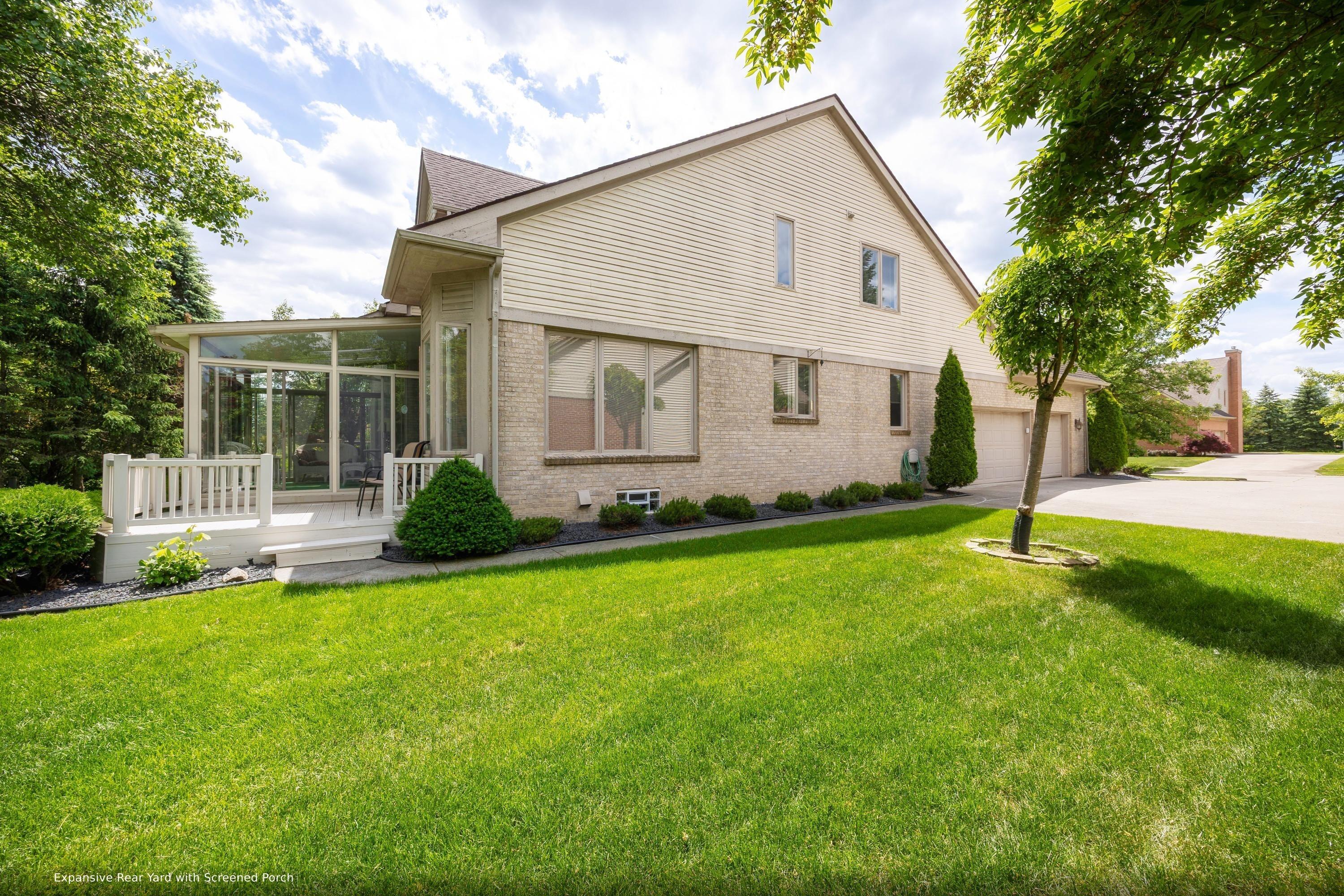 47968 Inveraray Road Canton, MI 48188 - Photo 6 of 66 canton-mi-rear-exterior-6