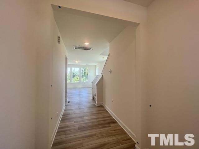 16 Nailsworth Street Angier, NC 27501 - Photo 4 of 11 a view of a hallway with wooden floor