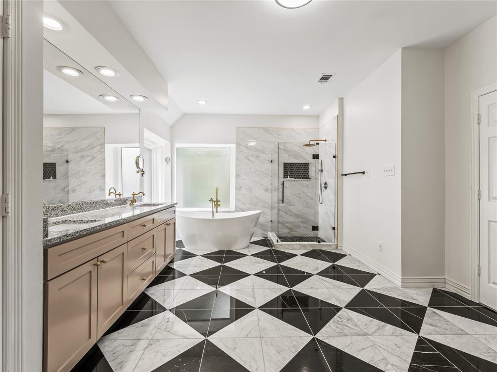 153 Meadowcreek Road Coppell, TX 75019 - Photo 24 of 35 Full bath featuring a marble finish shower, double vanity, a freestanding bath, and recessed lighting