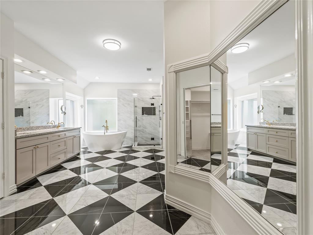 153 Meadowcreek Road Coppell, TX 75019 - Photo 26 of 35 Full bath with vanity, a freestanding tub, a marble finish shower, and recessed lighting