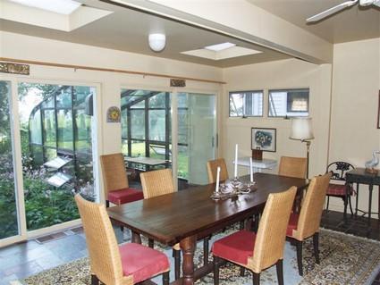 406-396 Sharon Road Salisbury, CT 06039 - Photo 9 of 20 a view of a dining room with furniture window and wooden floor