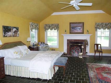 406-396 Sharon Road Salisbury, CT 06039 - Photo 10 of 20 a bedroom with a bed and a fireplace