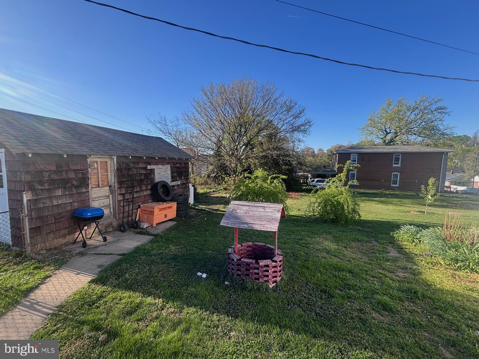 151 Howard Avenue Halethorpe, MD 21227 - Photo 19 of 21 Charming backyard with rustic shed.