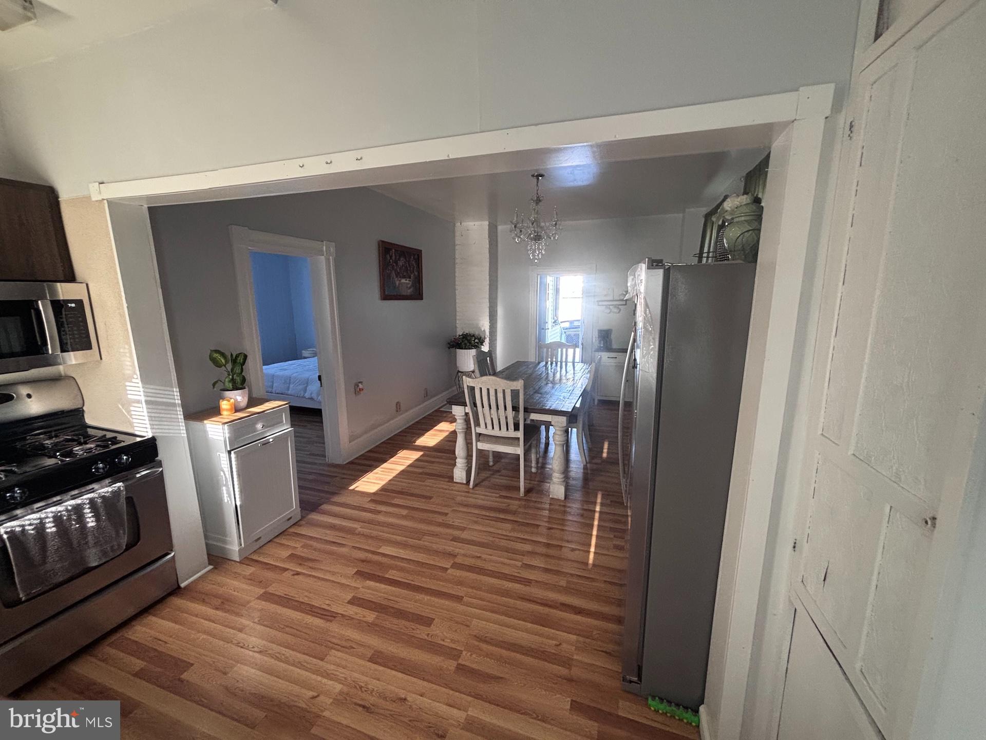 151 Howard Avenue Halethorpe, MD 21227 - Photo 4 of 21 Bright and inviting open kitchen space.