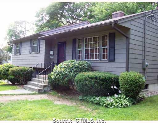 72 Ash Road Naugatuck, CT 06770 - Photo 1 of 1 a view of a house with a yard
