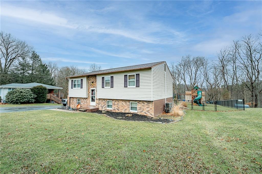 144 Stormer Road Indiana, PA 15701 - Photo 3 of 41 a view of a house with backyard and trees