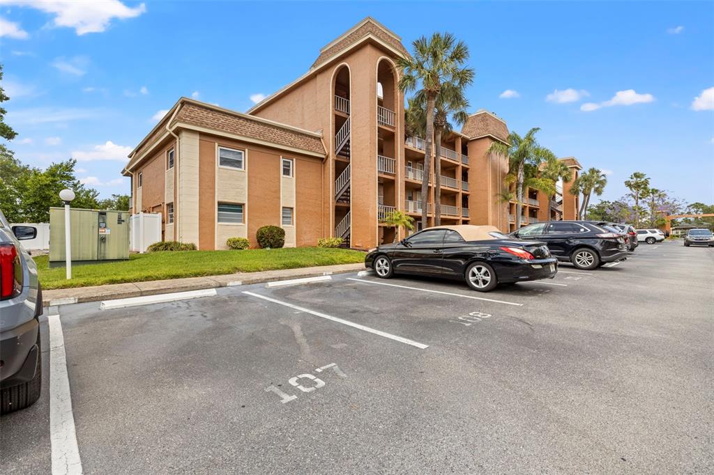 12760 Indian Rocks Road, Unit 107 Largo, FL 33774 - Photo 3 of 39 a car parked in front of a building