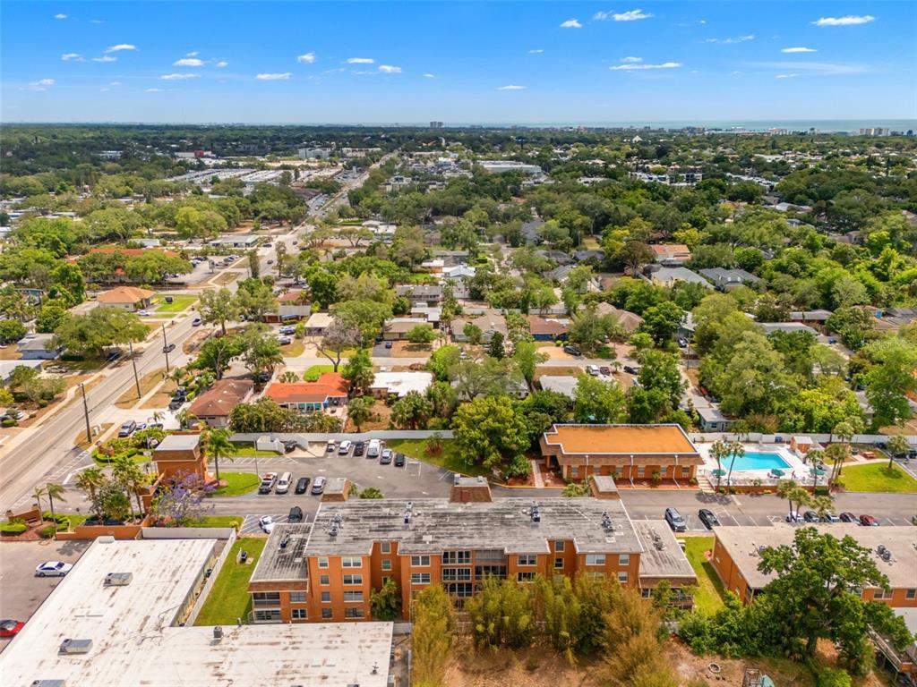 12760 Indian Rocks Road, Unit 107 Largo, FL 33774 - Photo 34 of 39 an aerial view of residential houses with outdoor space