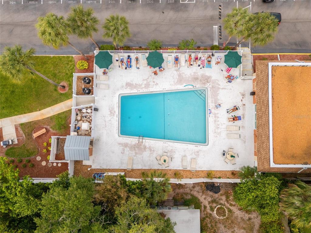 12760 Indian Rocks Road, Unit 107 Largo, FL 33774 - Photo 37 of 39 an outdoor space with swimming pool