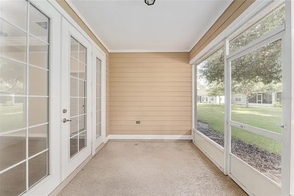 a view of an empty room and window