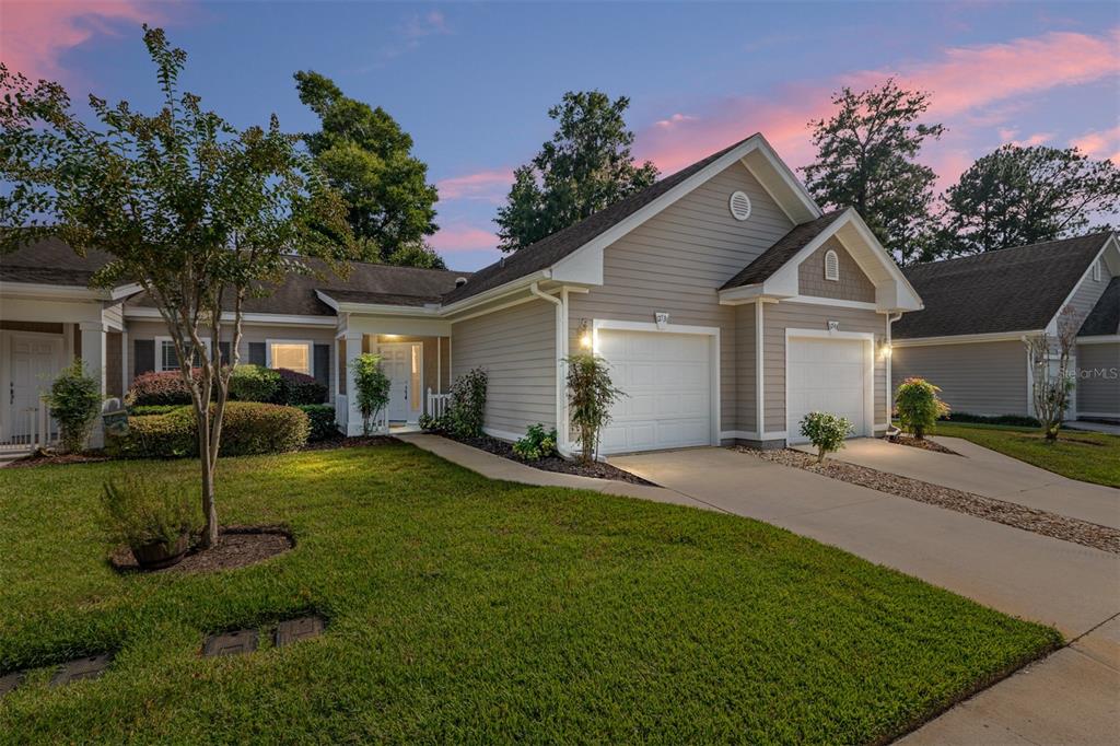 12731 Northwest 12th Road Newberry, FL 32669 - Photo 31 of 33 a front view of a house with a yard