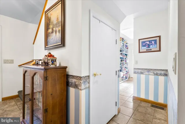a bathroom with a shower and a mirror
