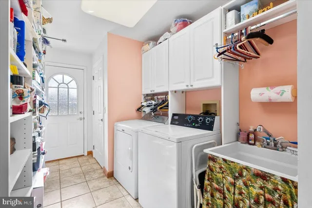 a view of a kitchen with fridge and rack