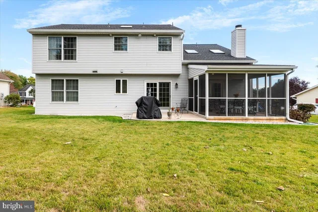 a view of a tree in a yard