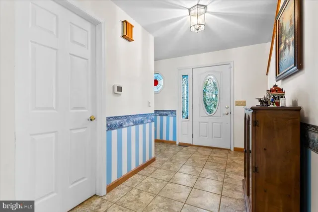 a view of a hallway view with staircase