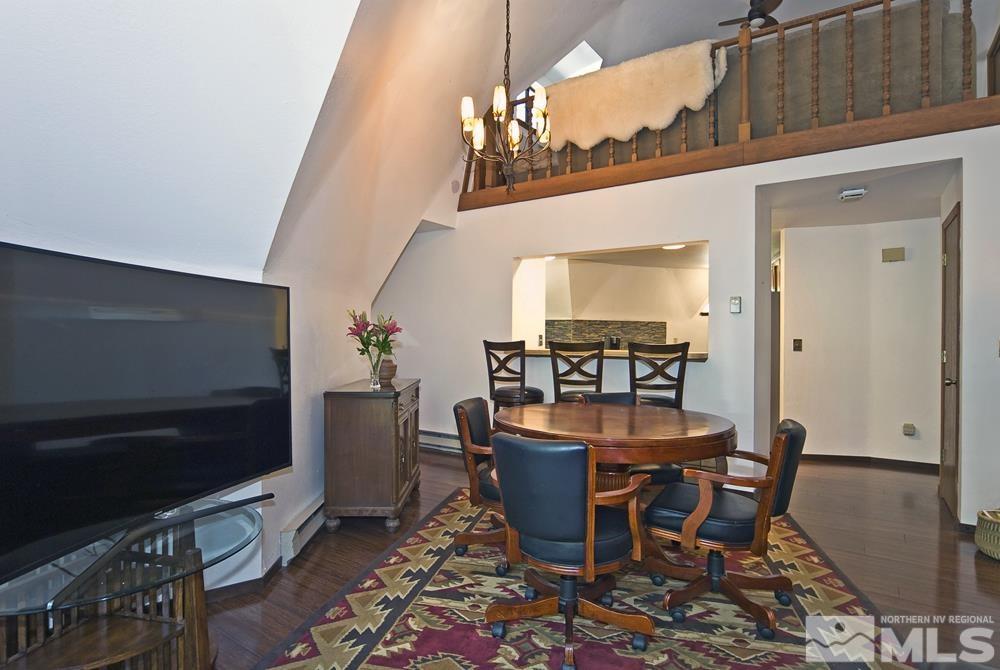 820 Hot Springs Road Markleeville, CA 96120 - Photo 17 of 36 a view of a dining room with furniture and wooden floor