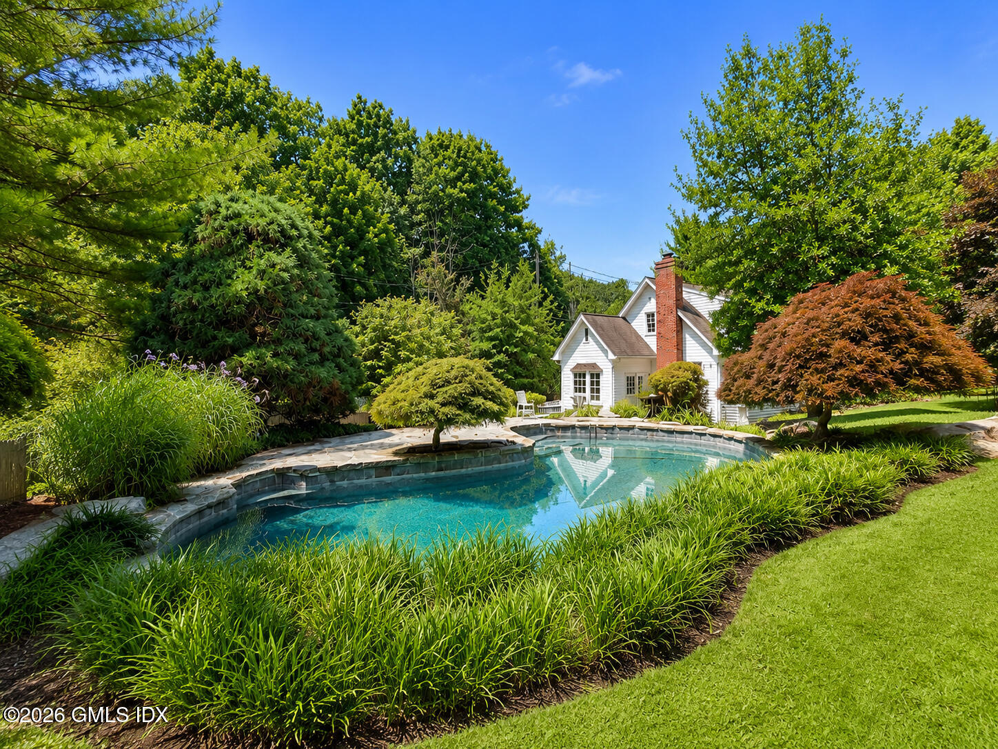 189 Riversville Road Greenwich, CT 06831 - Photo 1 of 8 Pool garden and house