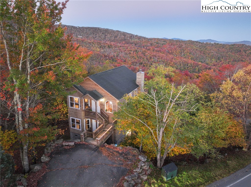 309 Pinnacle Ridge Road Beech Mountain, NC 28604 - Photo 28 of 45 a view of a house with a mountain