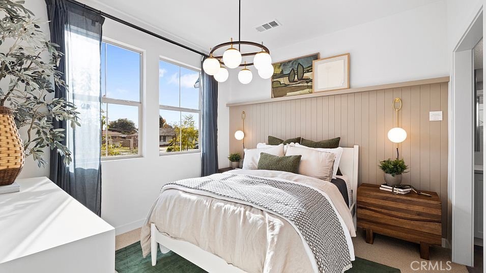 501 Tamarind Way, Unit F West Covina, CA 91791 - Photo 1 of 7 a bedroom with bed and a window