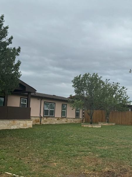 701 Rumage Road Jacksboro, TX 76458 - Photo 2 of 15 a front view of a house with a garden