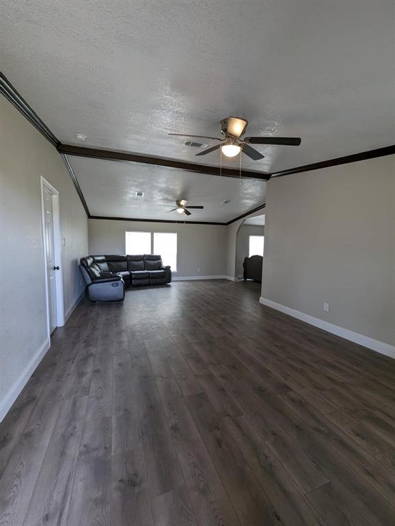 701 Rumage Road Jacksboro, TX 76458 - Photo 6 of 15 a view of empty room with wooden floor