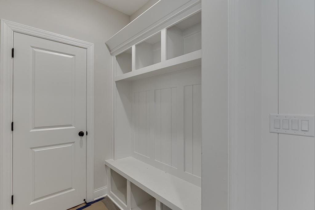 173 Swimming Pool Road Buford, GA 30518 - Photo 20 of 35 a bathroom with a bathtub